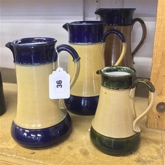 4 x graduated Doulton stoneware jugs